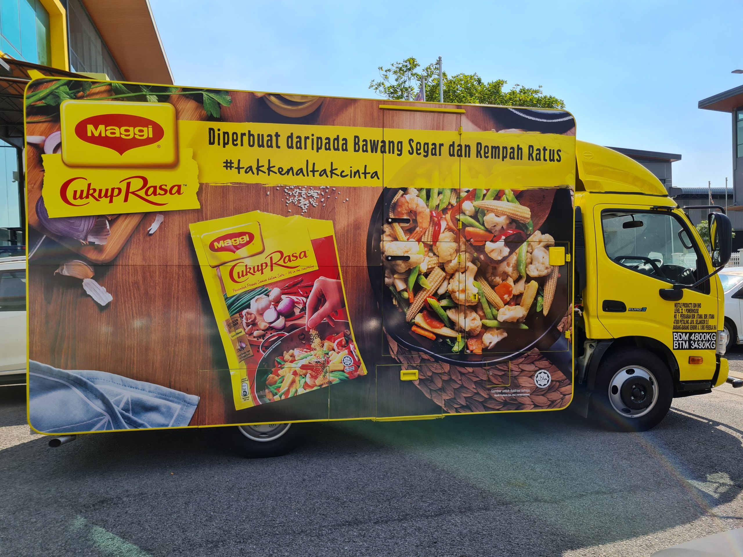 BEST Express truck with full fleet graphics outside Scapemedia