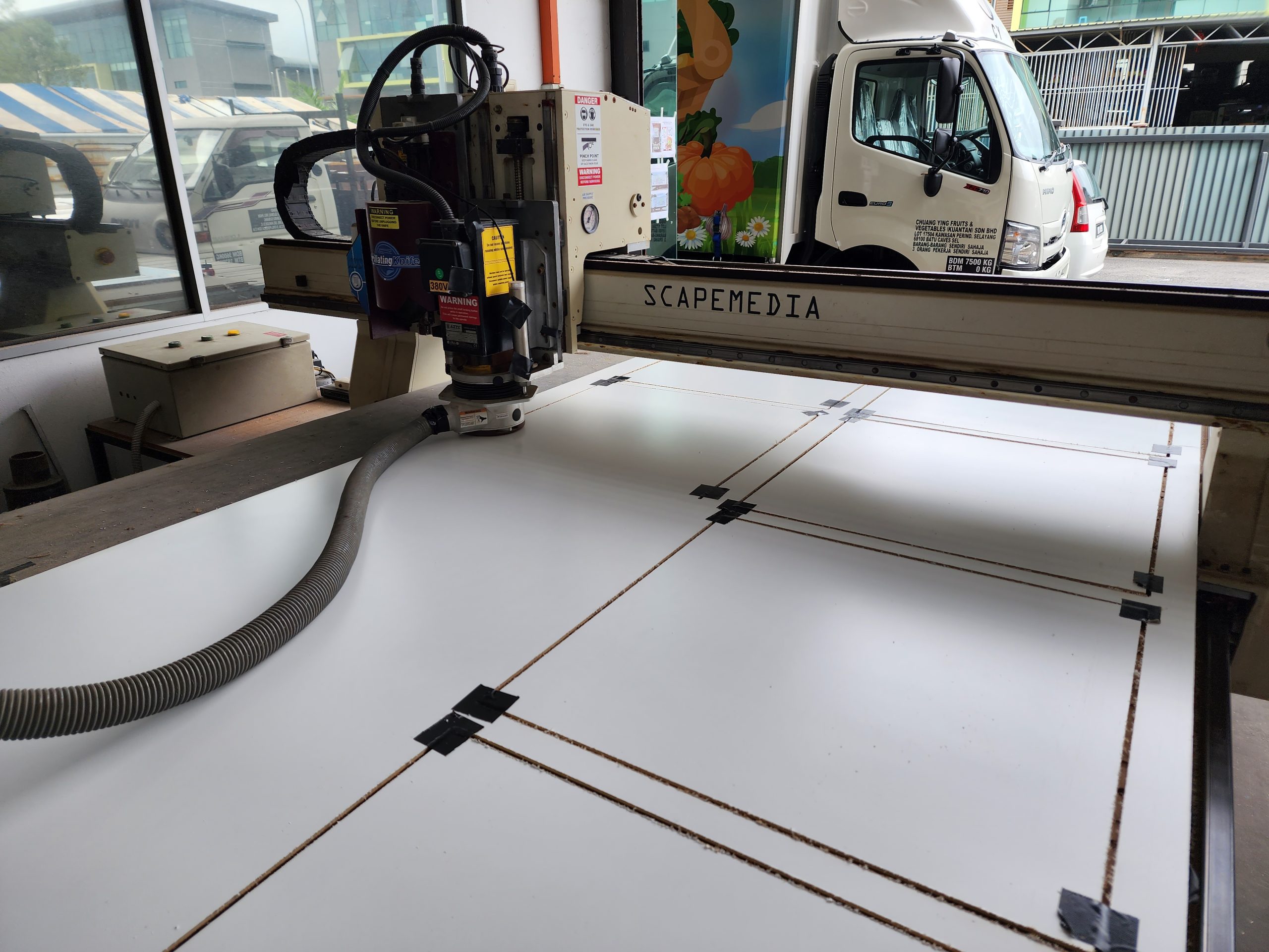 CNC router for cutting wood, ACPs and acrylics